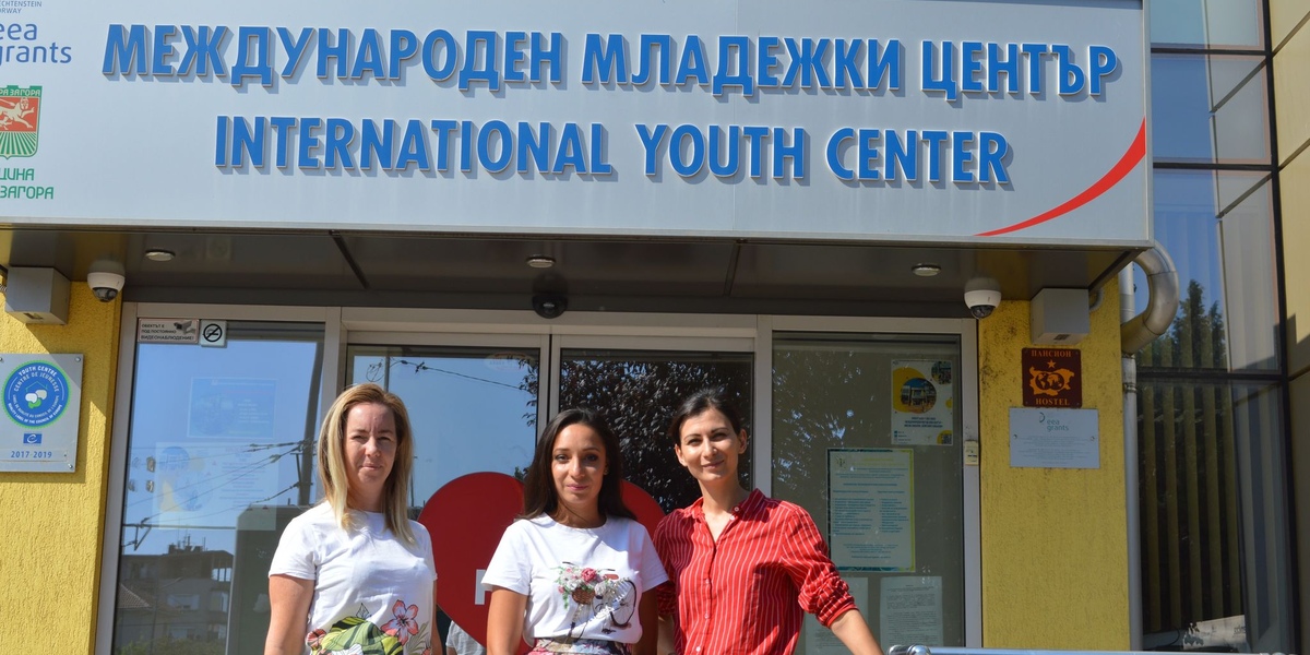 left to right - Boyana, Monica and Vesela standing in front of the Youth Center