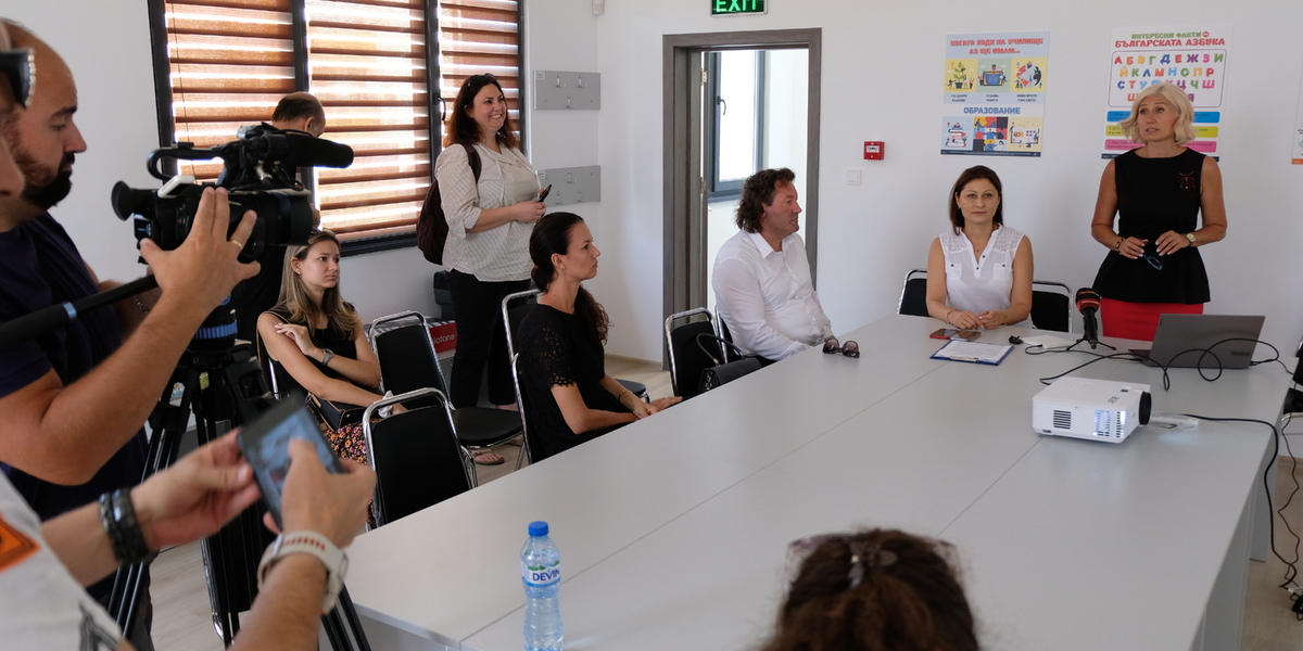 Mrs. Petrova tells the story of the center for the media and the formal guests